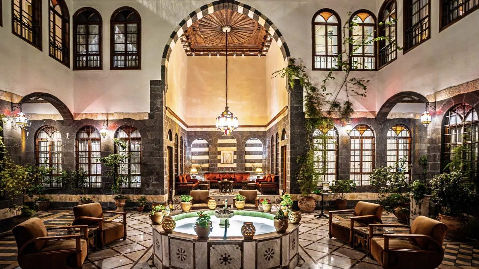 The lantern-lit courtyard of a restored Damascene house